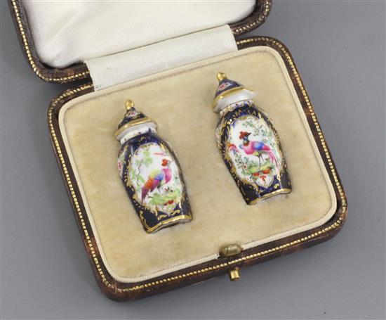 A pair of Royal Worcester miniature hexagonal scale blue jars and covers, c.1910, height 3.5cm, in a fitted case